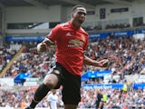 Anthony Martial celebrates the fourth during the Premier League game between Swansea City and Manchester United on August 19, 2017