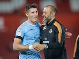 Wolves skipper Danny Batth celebrates with manager Nuno Espirito Santo during the EFL Cup game between Southampton and Wolverhampton Wanderers on August 23, 2017