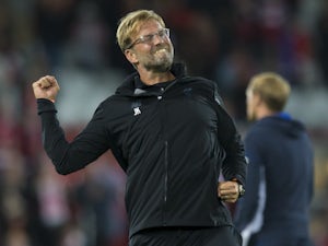 Klopp "optimistic" about Liverpool chances