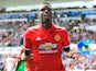 Paul Pogba celebrates getting the third during the Premier League game between Swansea City and Manchester United on August 19, 2017