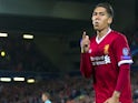 Roberto Firmino delivers an unorthodox celebration after scoring during the Champions League playoff between Liverpool and Hoffenheim on August 23, 2017