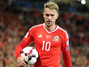 Wales strike late to climb up to second