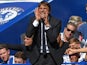 Antonio Conte orders the gabagool during the Premier League game between Chelsea and Everton on August 27, 2017