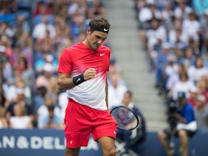 Federer books quarter-final spot