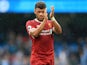 Alex Oxlade-Chamberlain celebrates during the Premier League game between Manchester City and Liverpool on September 9, 2017