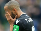 Andros Townsend dries his eyes during the Premier League game between Burnley and Crystal Palace on September 10, 2017