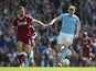 Jordan Henderson and Kevin De Bruyne in action during the Premier League game between Manchester City and Liverpool on September 9, 2017