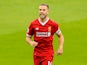 Liverpool captain Jordan Henderson barks orders during his side's Premier League clash with Watford at Vicarage Road on August 12, 2017