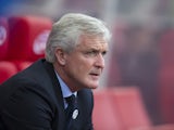Mark Hughes watches on during the Premier League game between Stoke City and Manchester United on September 9, 2017