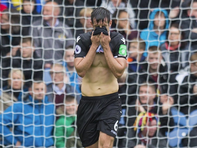 Scott Dann reacts to a missed opportunity during the Premier League game between Burnley and Crystal Palace on September 10, 2017