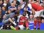 Danny Welbeck sits injured during the Premier League game between Chelsea and Arsenal on September 17, 2017