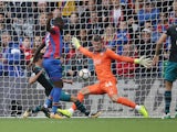 Fraser Forster saves a Christian Benteke shot during the Premier League game between Crystal Palace and Southampton on September 16, 2017