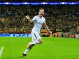 Tottenham Hotspur striker Harry Kane celebrates scoring for his side during their Champions League Group H clash with Borussia Dortmund at Wembley on September 13, 2017