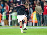 Jack Wilshere warms up ahead of the Europa League game between Arsenal and FC Koln on September 14, 2017