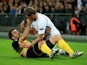 Jan Vertonghen grapples with Sokratis Papastathopoulos during the Champions League game between Tottenham Hotspur and Borussia Dortmund on September 13, 2017