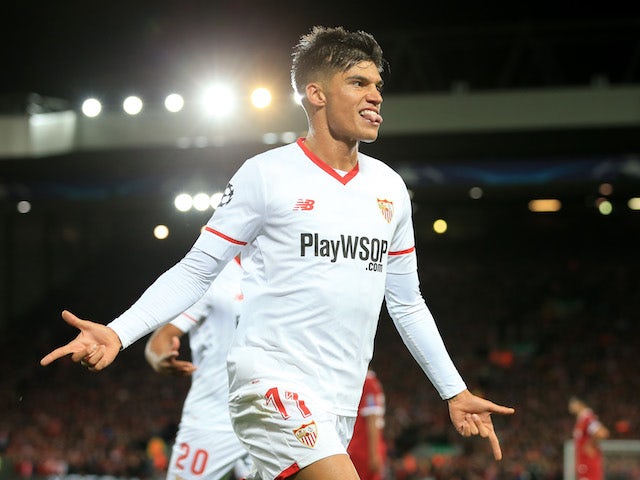 Sevilla forward Joaquin Correa clelebrates scoring for his side during their Champions League Group E clash with Liverpool at Anfield on September 13, 2017