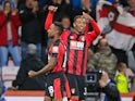 Jordon Ibe celebrates with Jermain Defoe during the Premier League game between Bournemouth and Brighton & Hove Albion on September 15, 2017