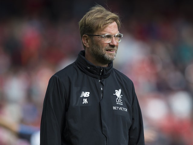 Jurgen Klopp watches the warm-up ahead of the Premier League game between Liverpool and Burnley on September 16, 2017