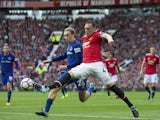 Phil Jones and young Tom Davies in action during the Premier League game between Manchester United and Everton on September 17, 2017