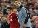 Liverpool manager Jurgen Klopp speaks to Philippe Coutinho during their Champions League Group E clash with Sevilla at Anfield on September 13, 2017
