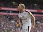 Scott Arfield celebrates opening the scoring during the Premier League game between Liverpool and Burnley on September 16, 2017