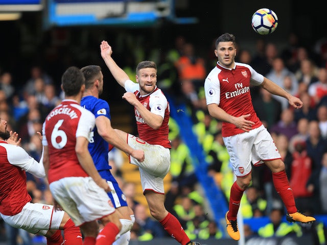 Shkodran Mustafi scores a disallowed goal during the Premier League game between Chelsea and Arsenal on September 17, 2017