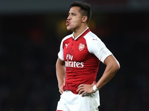 Alexis Sanchez puckers up during the EFL Cup game between Arsenal and Doncaster Rovers on September 20, 2017