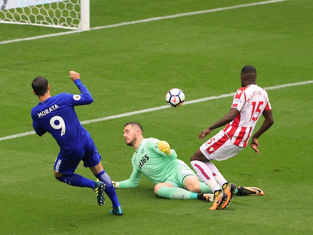 Alvaro Morata scores the opener during the Premier League game between Stoke City and Chelsea on September 23, 2017