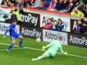 Alvaro Morata scores the Blues' third during the Premier League game between Stoke City and Chelsea on September 23, 2017