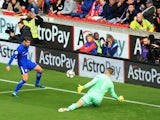 Alvaro Morata scores the Blues' third during the Premier League game between Stoke City and Chelsea on September 23, 2017