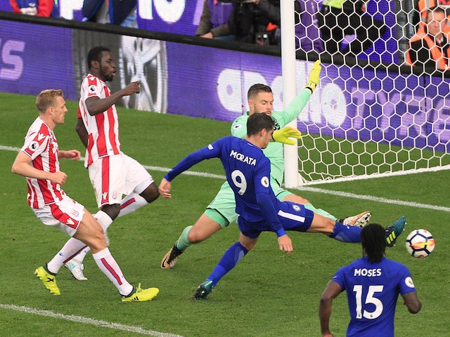 Alvaro Morata completes his hat-trick during the Premier League game between Stoke City and Chelsea on September 23, 2017