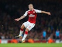 A shaven-headed Jack Wilshere in action during the EFL Cup game between Arsenal and Doncaster Rovers on September 20, 2017