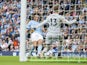 Leroy Sane scores past Wayne Hennessey during the Premier League game between Manchester City and Crystal Palace on September 23, 2017