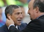 Rafael Benitez cleans Chris Hughton's ears during the Premier League game between Brighton & Hove Albion and Newcastle United on September 24, 2017