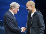 Roy Hodgson and Pep Guardiola shake hands ahead of the Premier League game between Manchester City and Crystal Palace on September 23, 2017