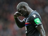 Crystal Palace defender Mamadou Sakho reacts after seeing his side concede during their Premier League clash with Manchester United at Old Trafford on September 30, 2017