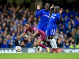 Tiemoue Bakayoko and N'Golo Kante deny all knowledge as Raheem Sterling goes down during the Premier League game between Chelsea and Manchester City on September 30, 2017