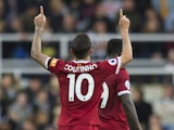 Liverpool midfielder Philippe Coutinho reacts after scoring during his side's Premier League clash with Newcastle United at St James' Park on October 1, 2017