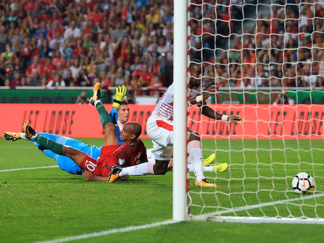 The first goal goes over the line during the World Cup qualifier between Portugal and Switzerland on October 10, 2017