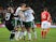 Irish players celebrate next to a dejected Joe Ledley after the World Cup qualifier between Wales and the Republic of Ireland on October 9, 2017