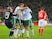 Irish players celebrate next to a dejected Joe Ledley after the World Cup qualifier between Wales and the Republic of Ireland on October 9, 2017