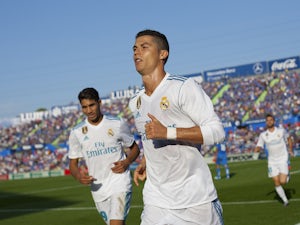 Ronaldo double sees Real edge past Eibar