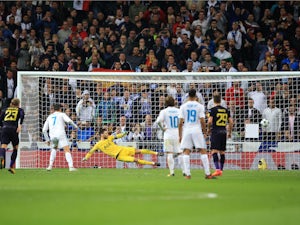 Tottenham earn draw at Real Madrid