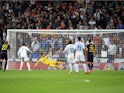 Cristiano Ronaldo scores from the spot during the Champions League group game between Real Madrid and Tottenham Hotspur on October 17, 2017