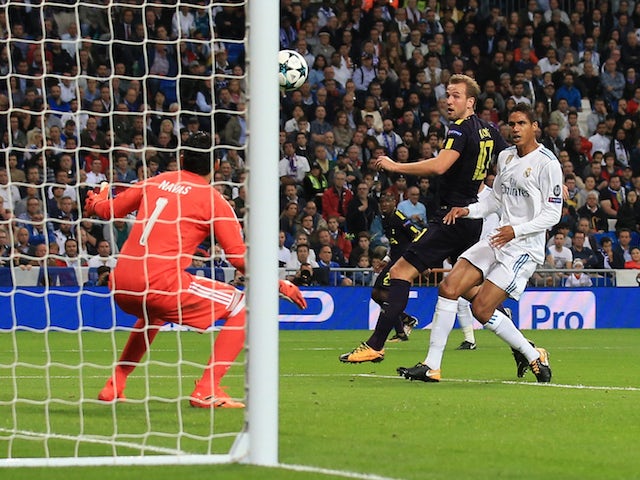 Harry Kane scores the opener during the Champions League group game between Real Madrid and Tottenham Hotspur on October 17, 2017