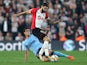 Mikel Merino tackles Charlie Austin during the Premier League game between Southampton and Newcastle United on October 15, 2017