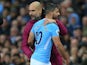 Pep Guardiola embraces Sergio Aguero during the Premier League game between Manchester City and Burnley on October 21, 2017