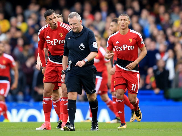 Hornets players complain to Jon Moss after Pedro nets the opener during the Premier League game between Chelsea and Watford on October 21, 2017
