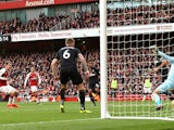 Aaron Ramsey scores during the Premier League game between Arsenal and Swansea City on October 28, 2017