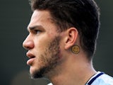 Ederson shows off an emoji tattoo during the Premier League game between West Bromwich Albion and Manchester City on October 28, 2017